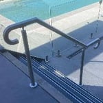 Small stainless handrail on some stairs.