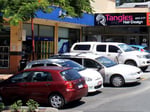 Street view of Tangles Hair Design with free street parking