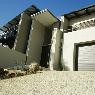 These garage doors can come with a smooth finish, or with lines or without lines, that have a timber grain texture.