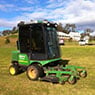 John Deere 1445 out-front mower, with 1.5m cutting width, used on large lawns around homes and estates.