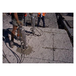 Splitting concrete on top of Dam wall using hydraulic splitters