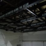 New structural beams installed over the existing stage to accomodate new stage rigging.