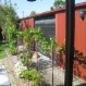 A motorised panel lift door garage door powder coated night sky, fitted to colorbond mano red garage in Sunshine, vic.