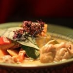 a popular thai curry with mixed vegetables scented with wild ginger, kaffir lime leaves, thai basil & lemongrass
