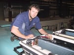 Vehikool Automotive - On Top of a Bus Roof Fixing the Air Conditioning