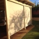 Cream zip track blinds, view from outside