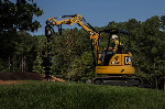 Excavator attachments: Buckets for trenching, Auger Drill, Grabs for rubbish, tree removal and stone wall building