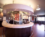 Custom Made Commercial Bar. Solid Surface And Feature Panelling
