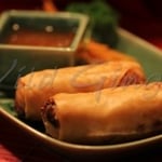 vegetables, vermicelli deep fried in a crispy rice paper roll served with sweet chilli sauce